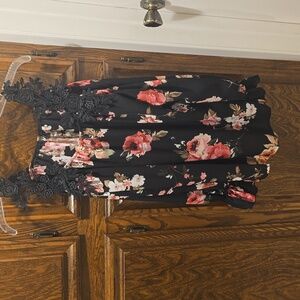 Adorable Black floral cold shoulder blouse...size S